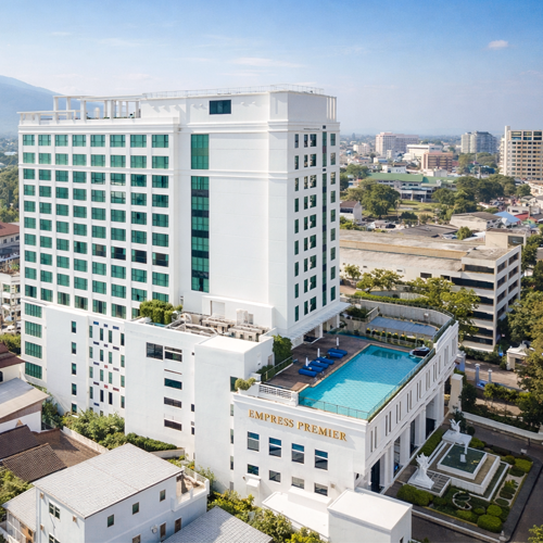 Empress Premier Chiang Mai hotel aerial view with rooftop pool and city skyline in Chiang Mai Thailand